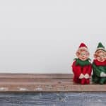 Image shows Christmas elf decorations to represent CORQ.'s new original report Christmas Unwrapped 2023